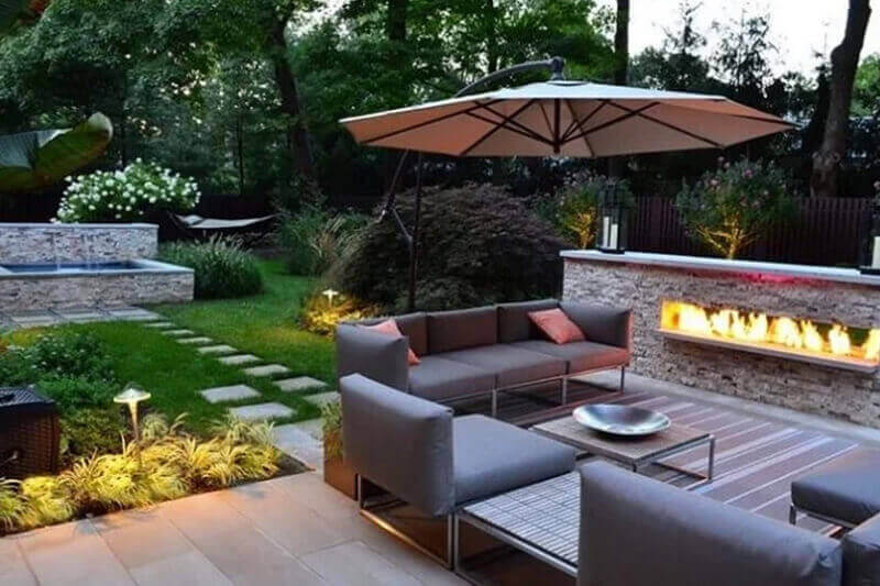 cozy backyard with outdoor fireplace